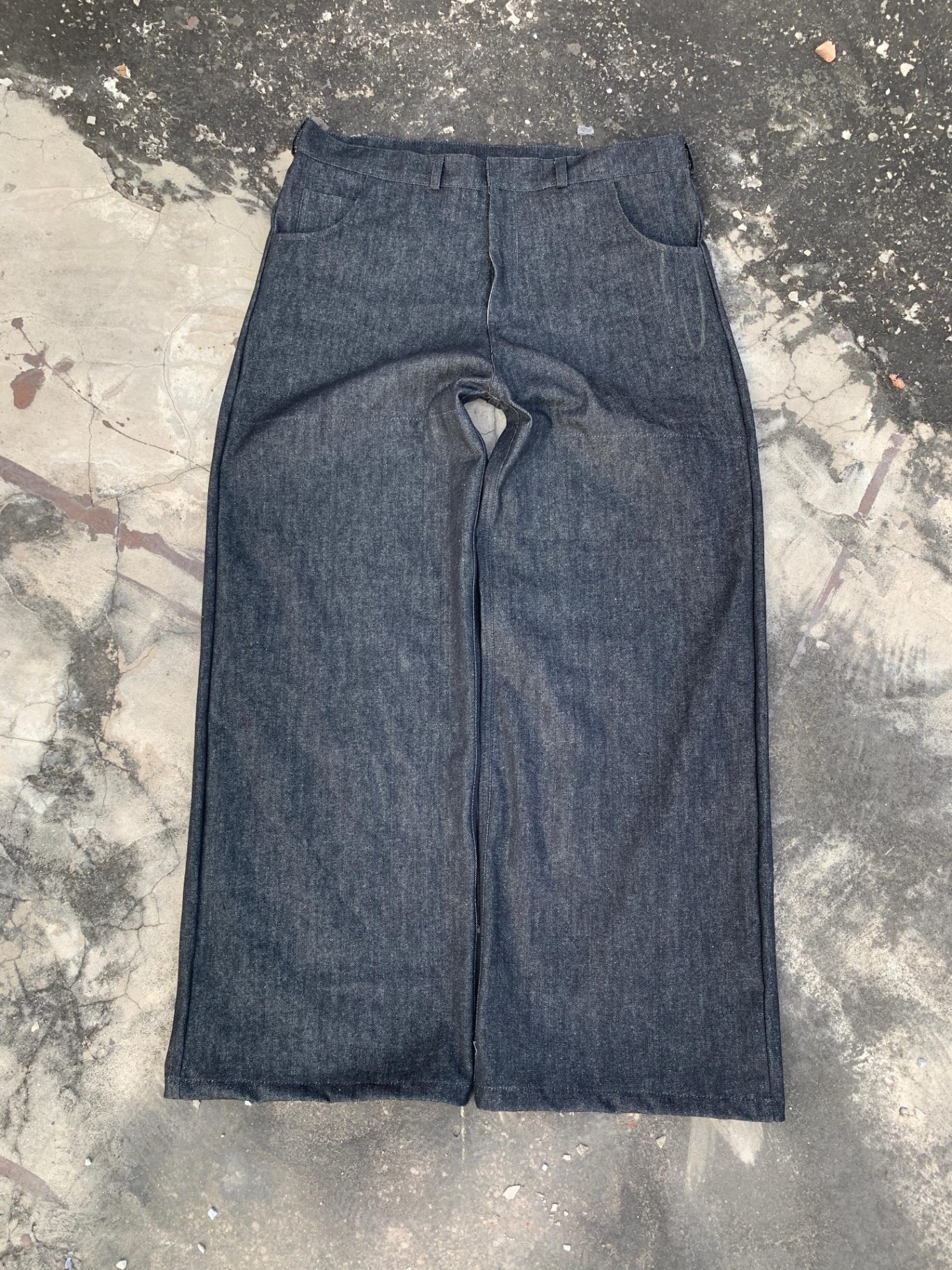 Custom raw denim wide-leg jeans cut and sewn from tech pack by Fateh Wear